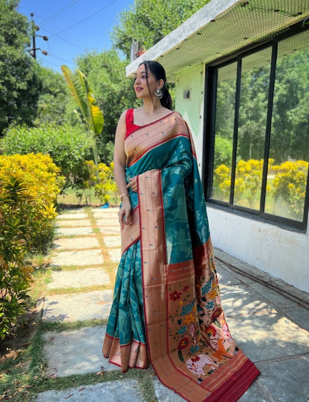 Teal Green and Red Silk Blend Saree with Traditional Animal Motif Weaving