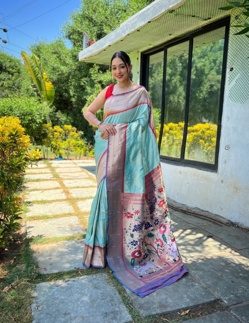 Serene Sky Blue and Peach Silk Blend Saree with Elegant Zari Border