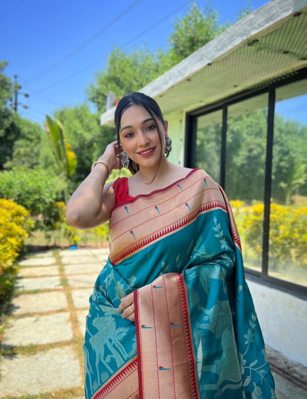 Teal Green and Red Silk Blend Saree with Traditional Animal Motif Weaving