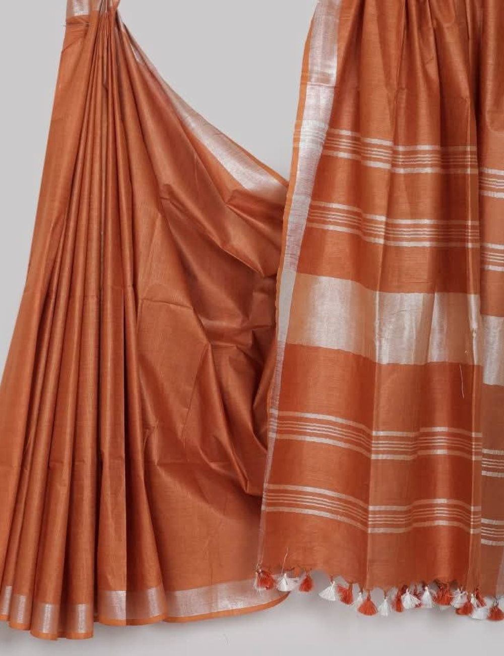 Rust Orange Linen Cotton Saree with Silver Zari & Contrast tassels